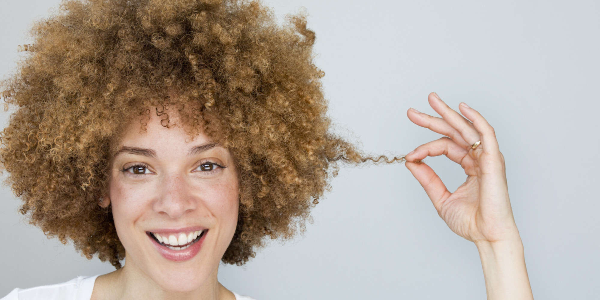 Black woman playing with hair