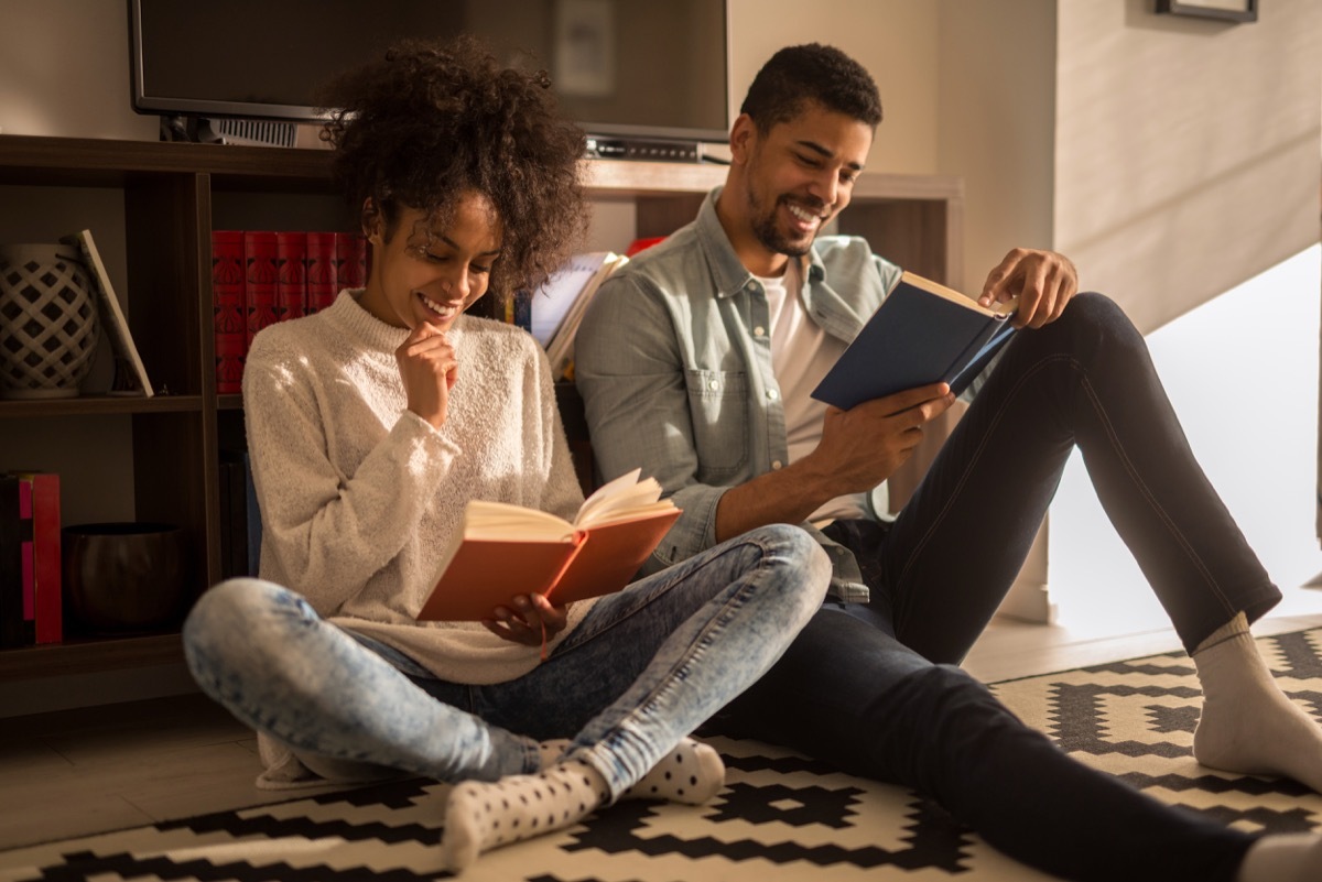 Couple reading side by side