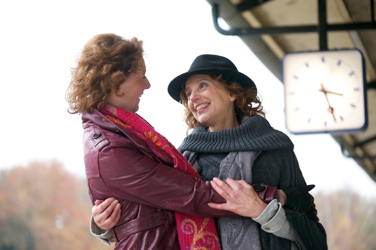 lesbian couple holding each other, long marriage tips