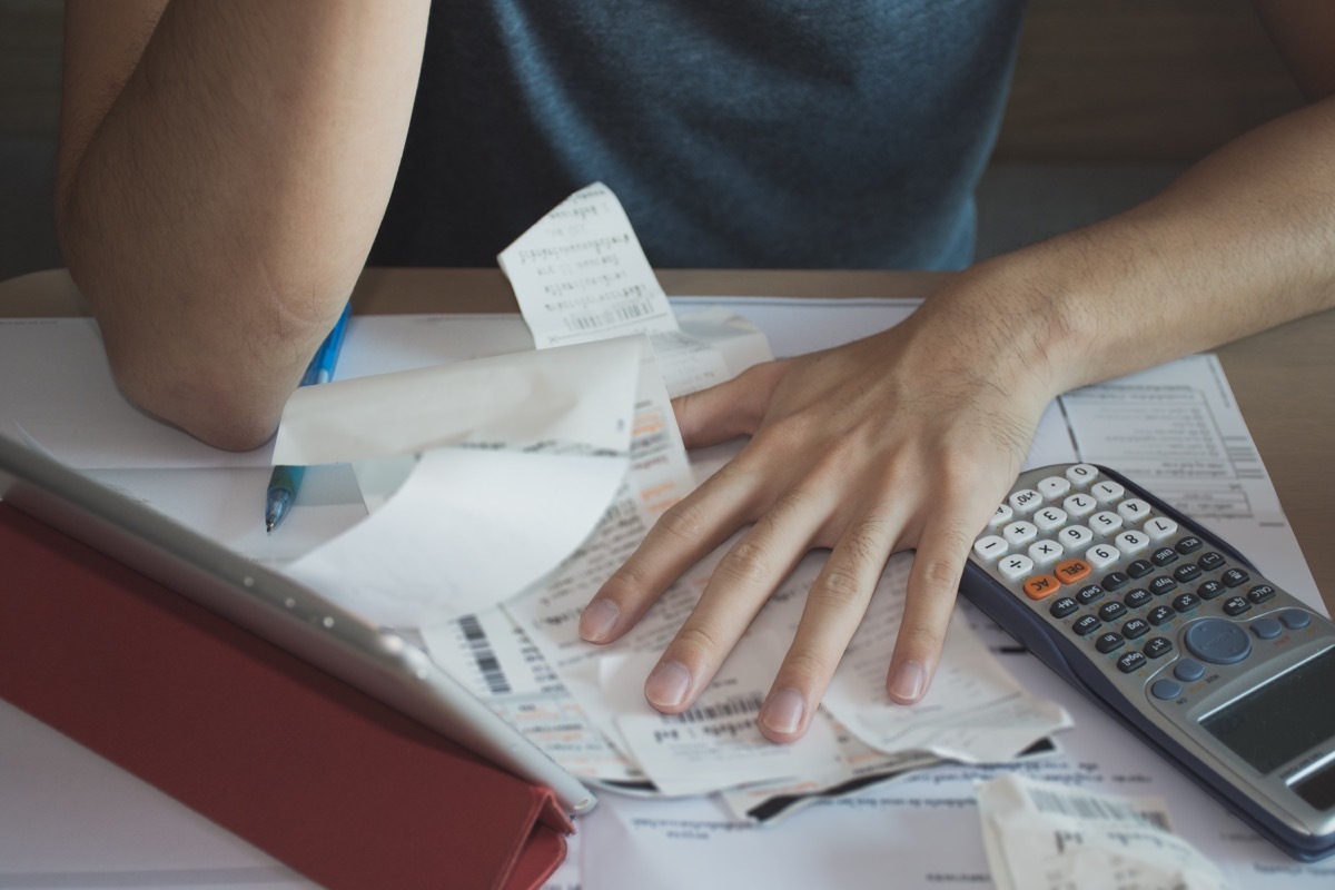 Person Sorting Through Finances