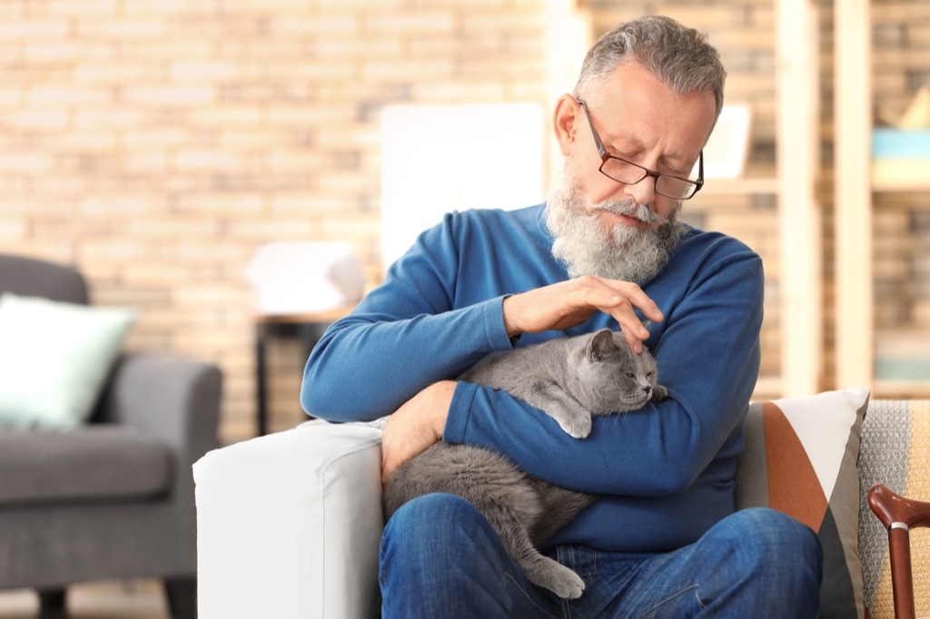 an old man and his cat