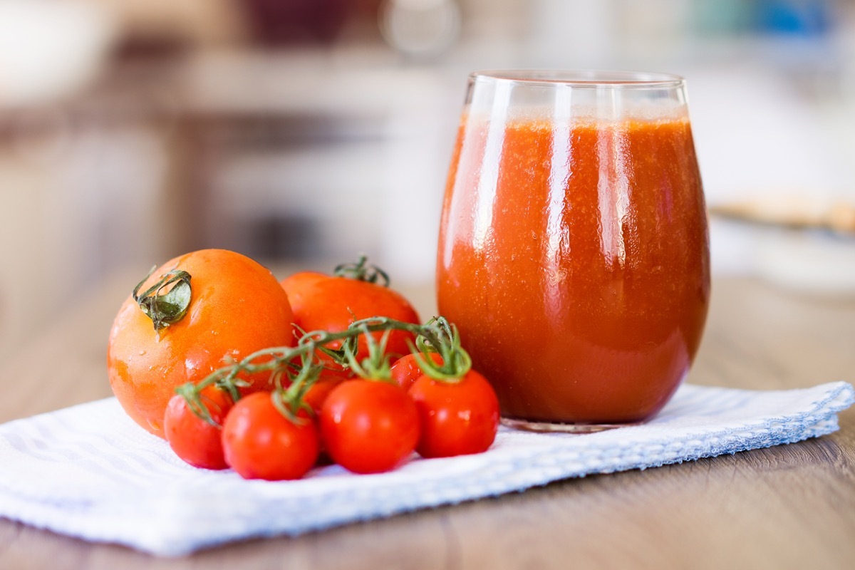 Tomato Juice on scarf over table