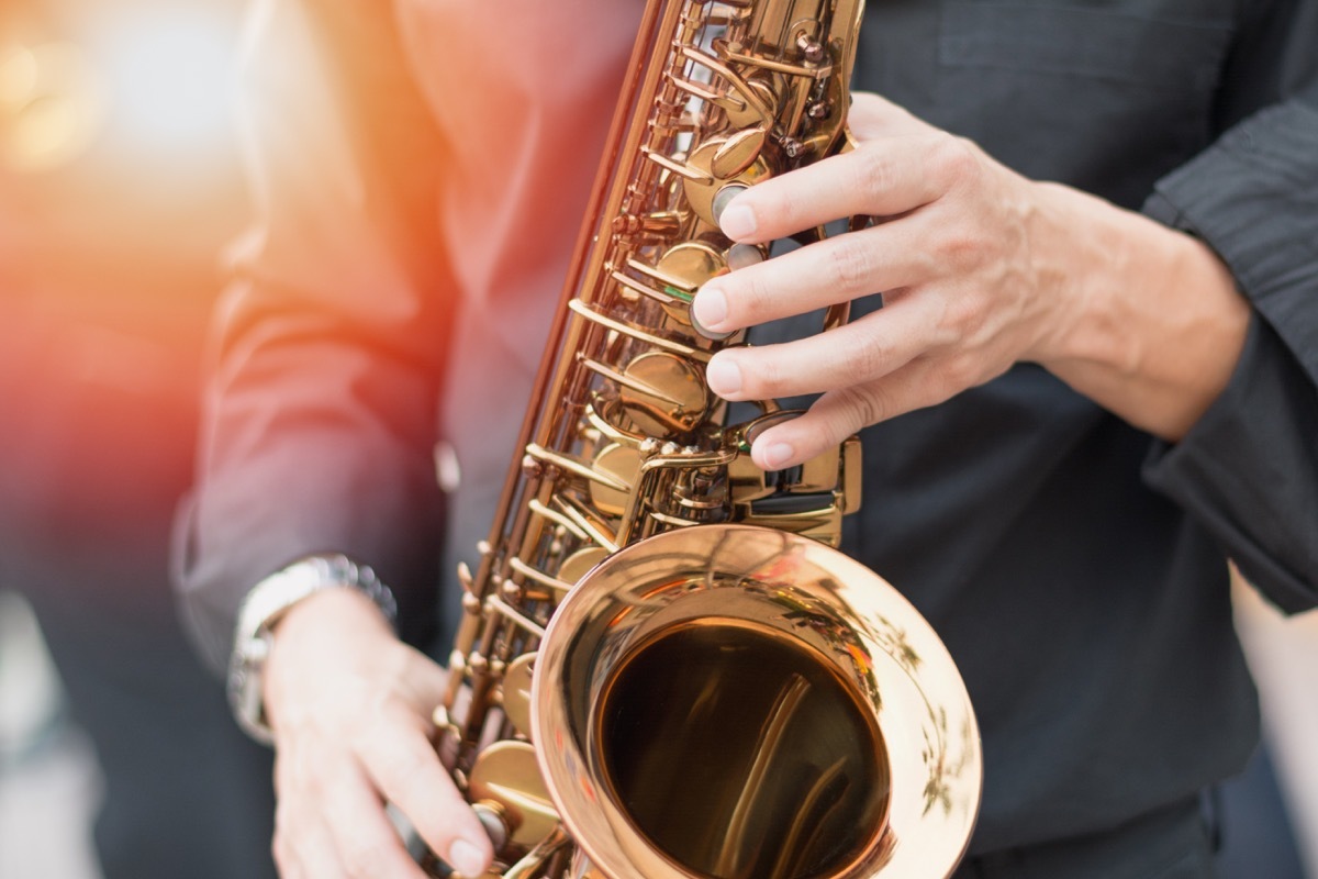 Person playing the saxophone