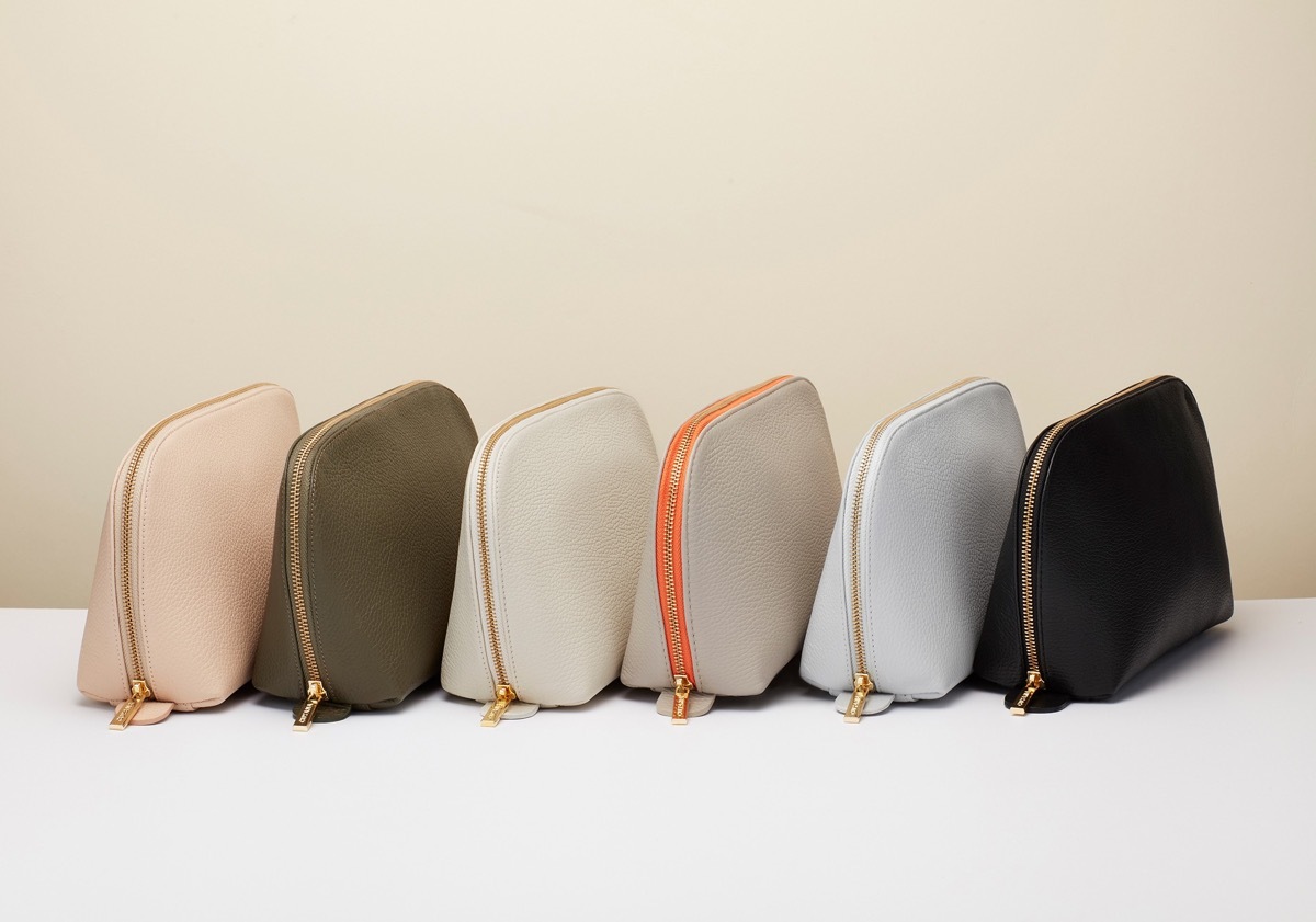 Row of travel bags in various colors