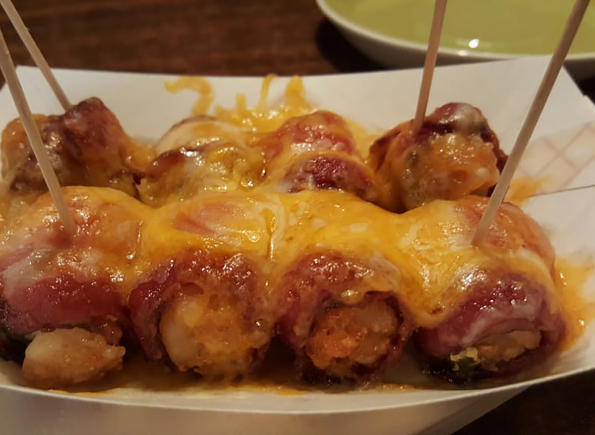 tater tots topped with bacon and cheese