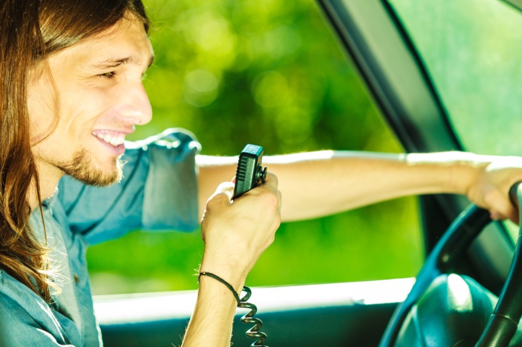 man using CB radio