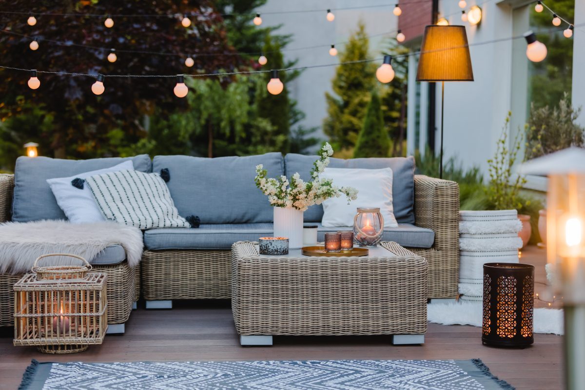 stylish patio with string globe lights