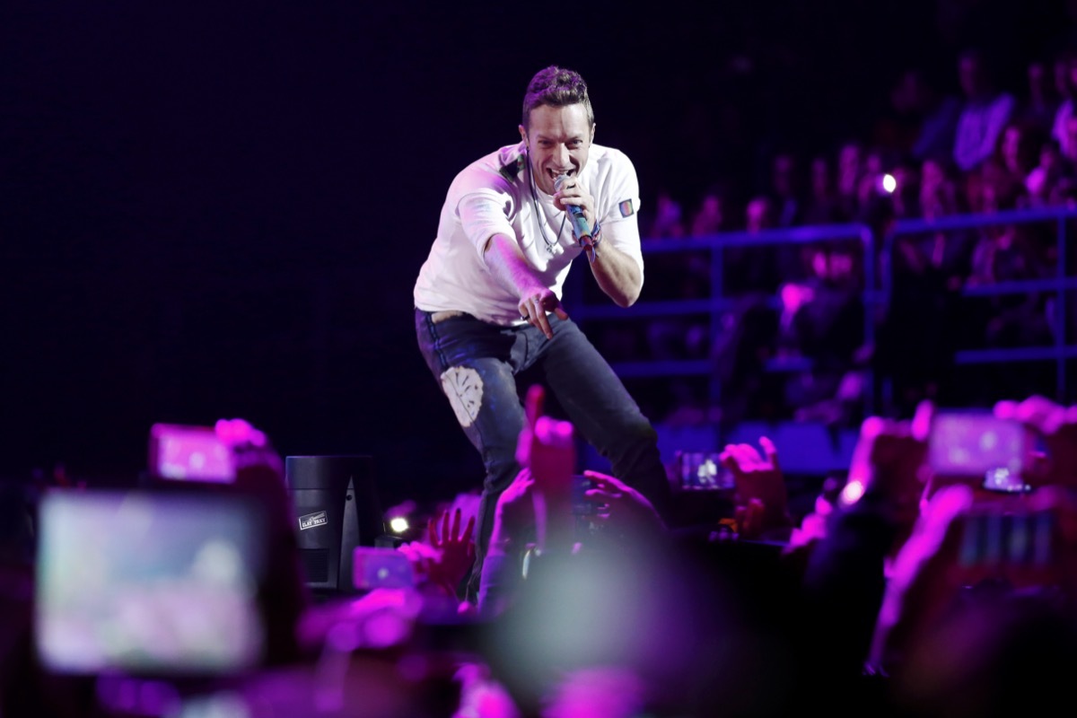 Chris Martin and Coldplay performing at the final night of X Factor Italy in 2016