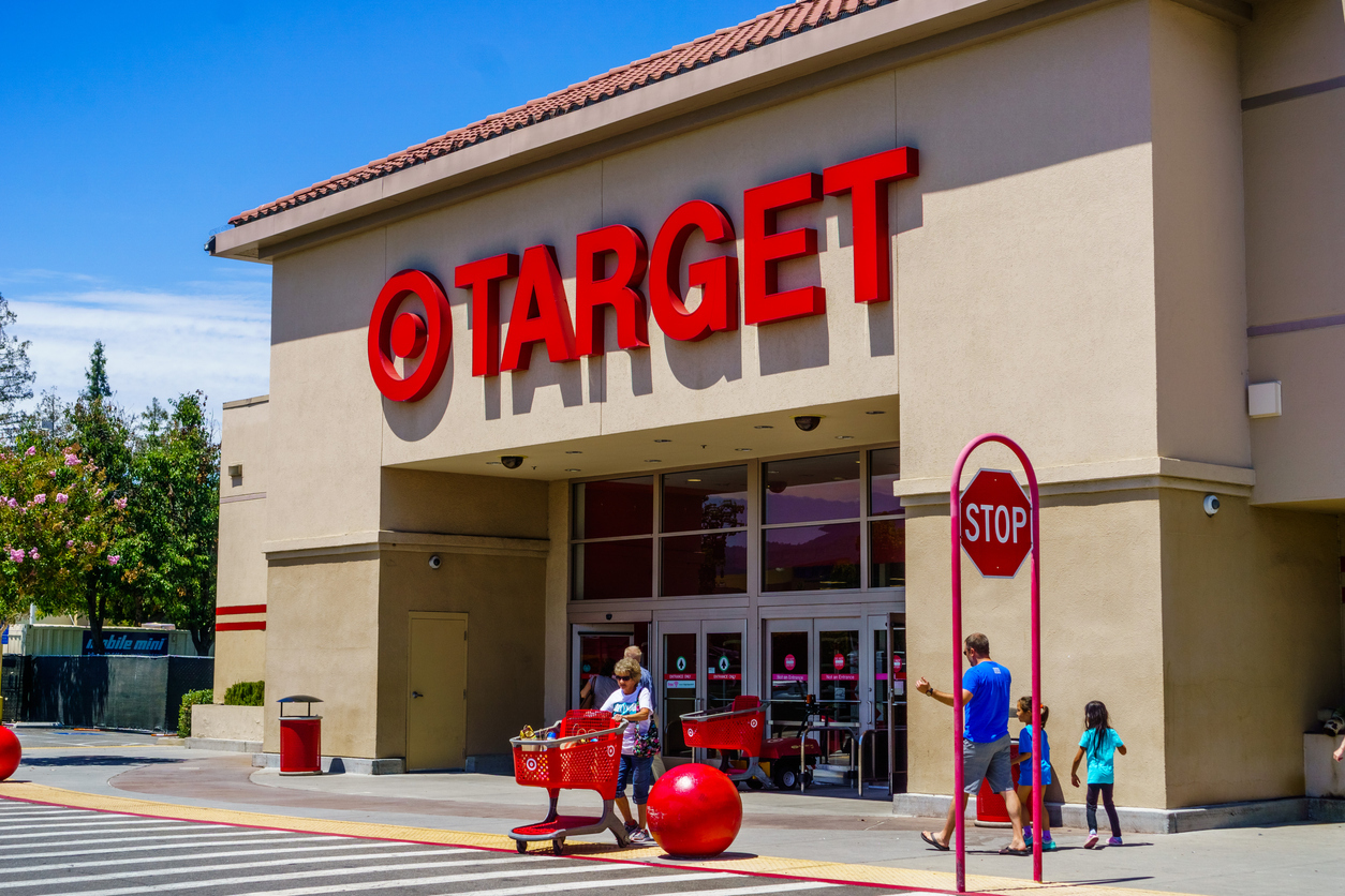 The entrance to a Target store with customers coming in and out