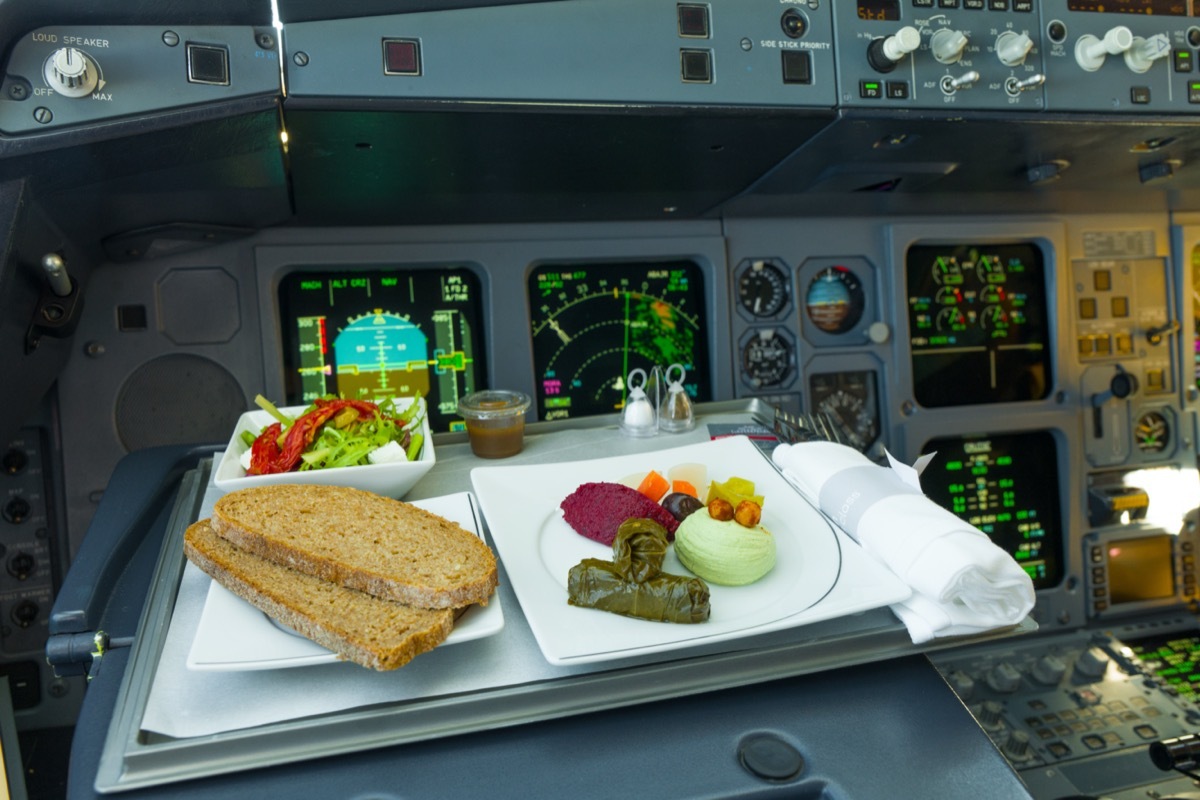 a pilot's food tray in the cockpit