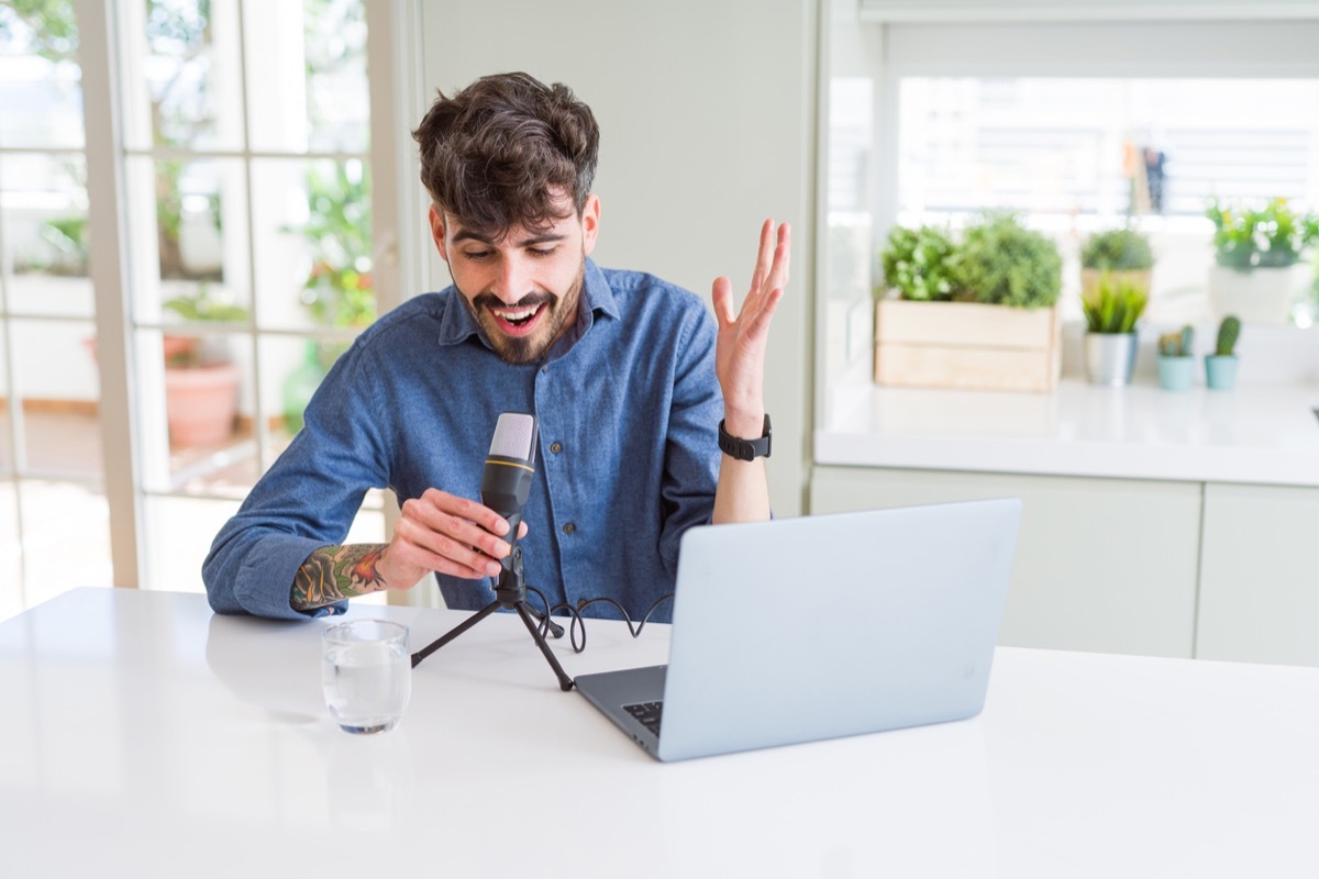 young man recording a podcast