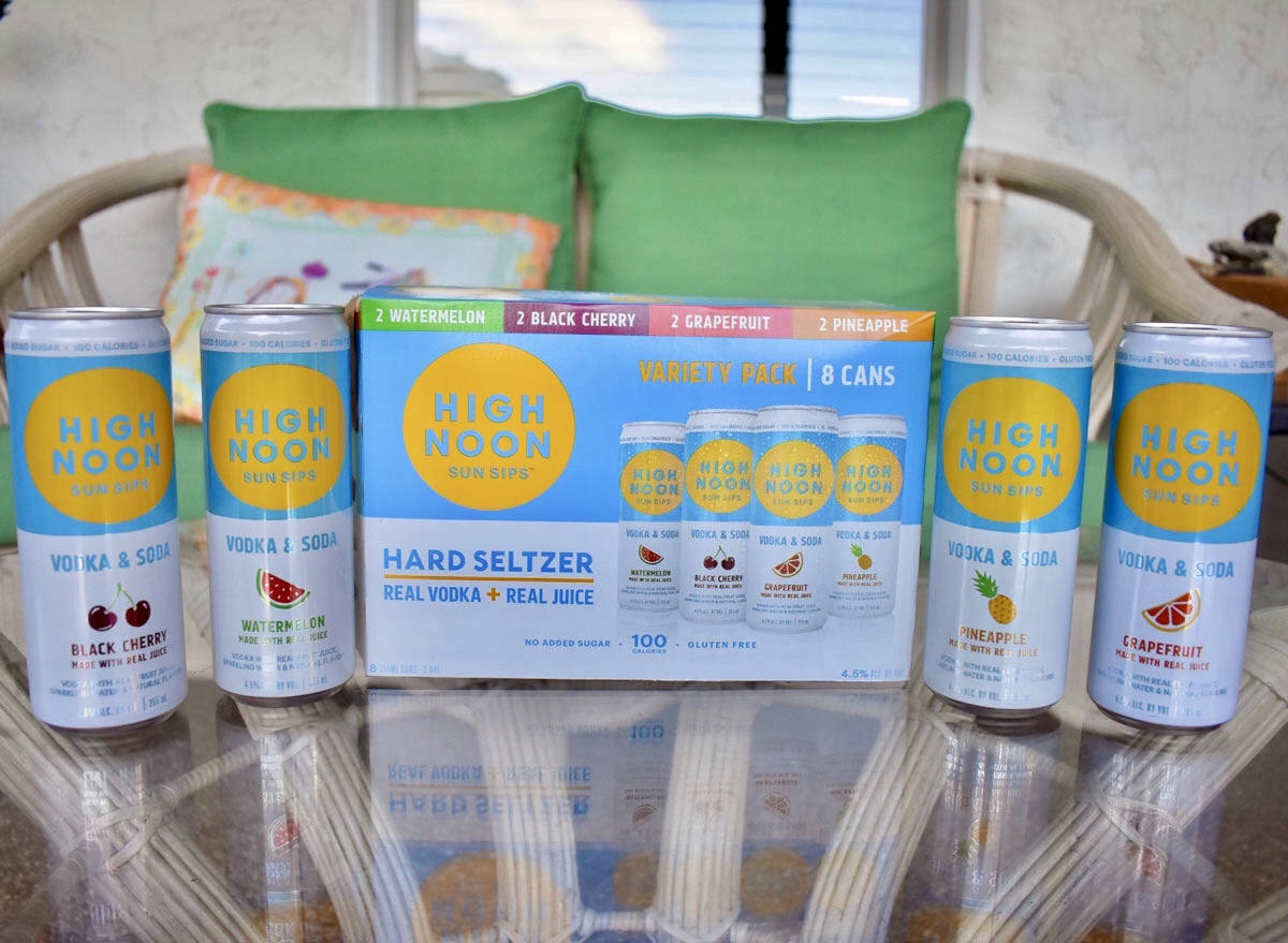 high noon spiked seltzer case with cans