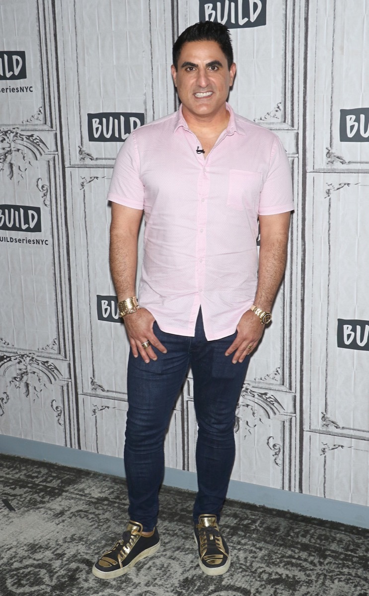 reza farahan in pink button down shirt