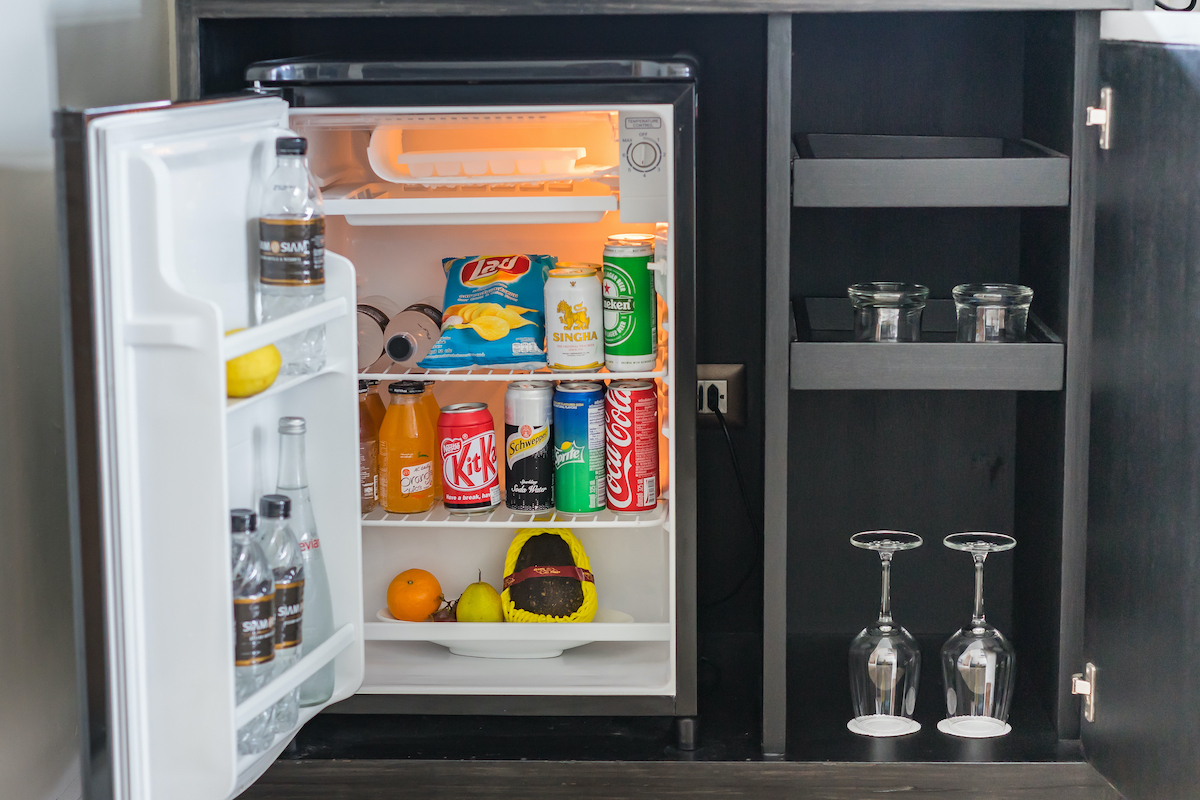 mini bar stocked into hotel room