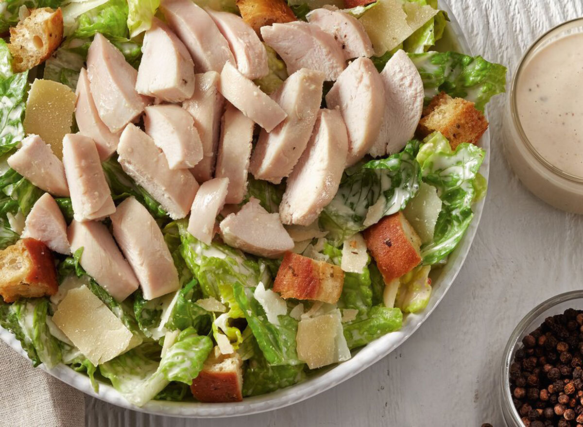 boston market chicken caesar salad in a bowl