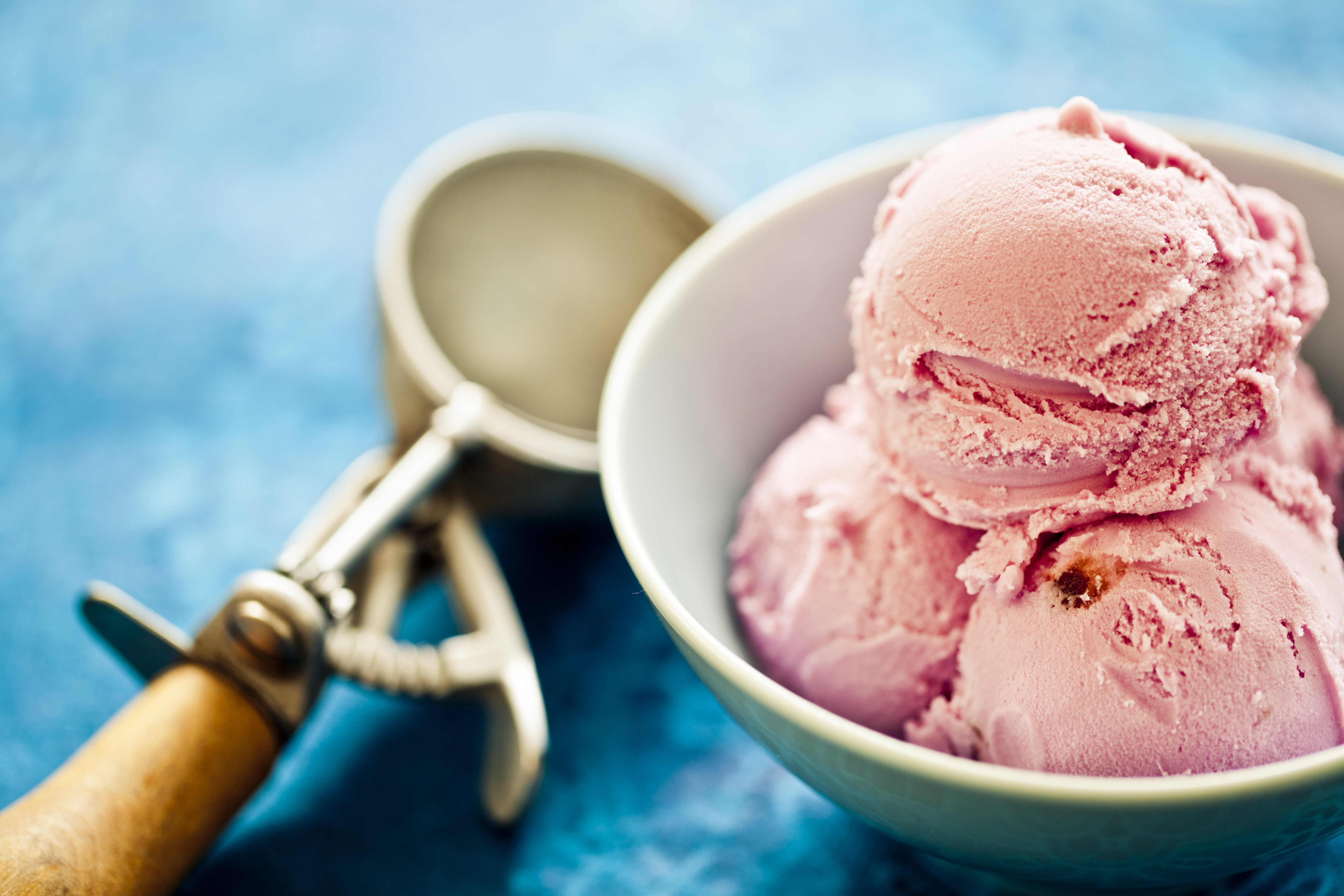 Delicious strawberry ice cream in a bowl.