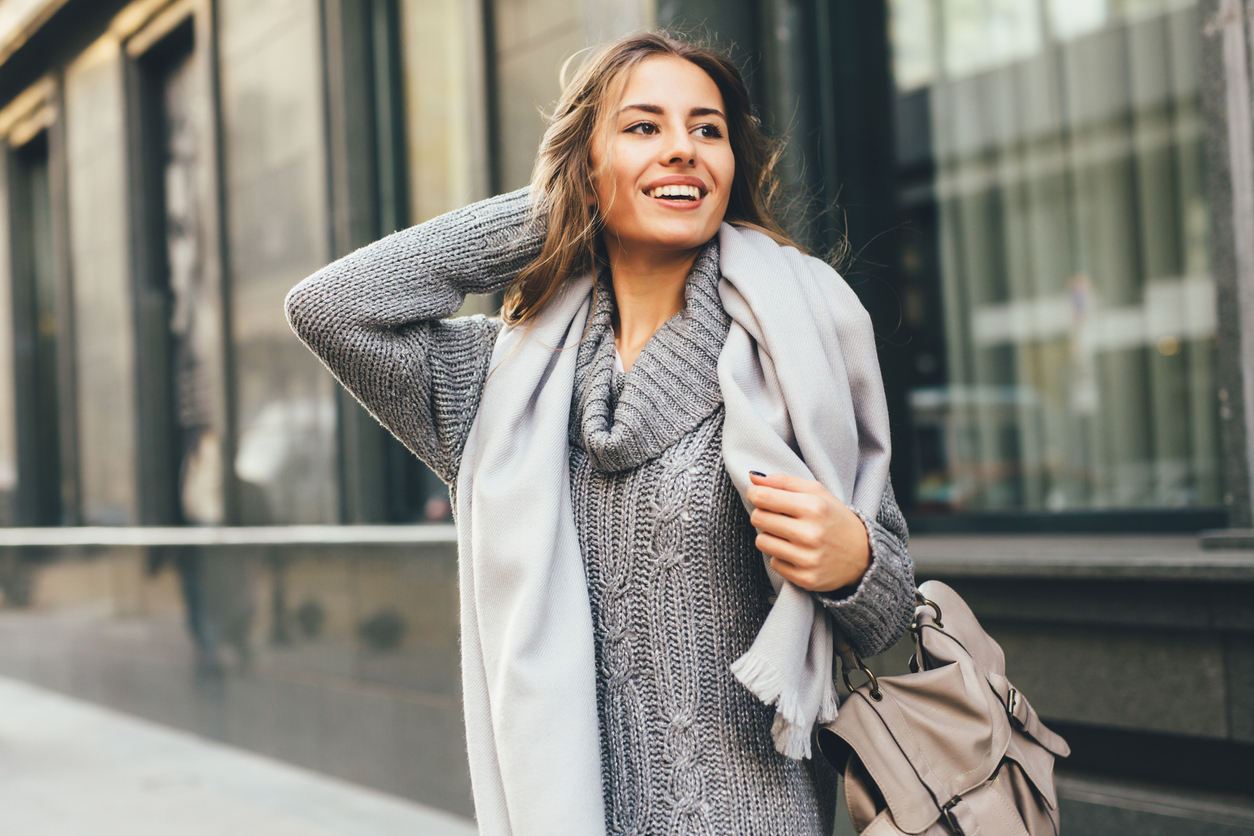 Portrait of a beautiful young woman outdoors.