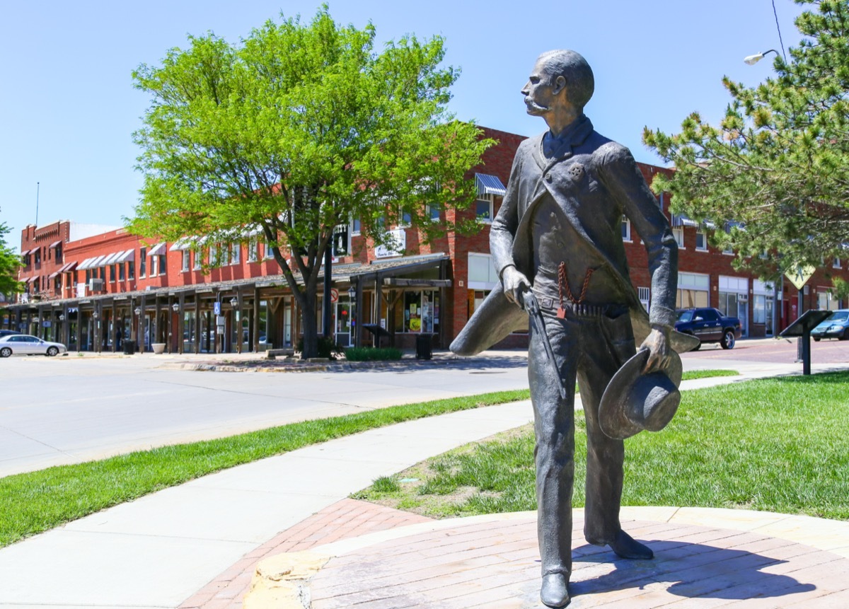 DODGE CITY, USA - MAY 17, 2015: Bronze sculpture of Wyatt Earp as part of the Trail of Fame in the historic district of the city.