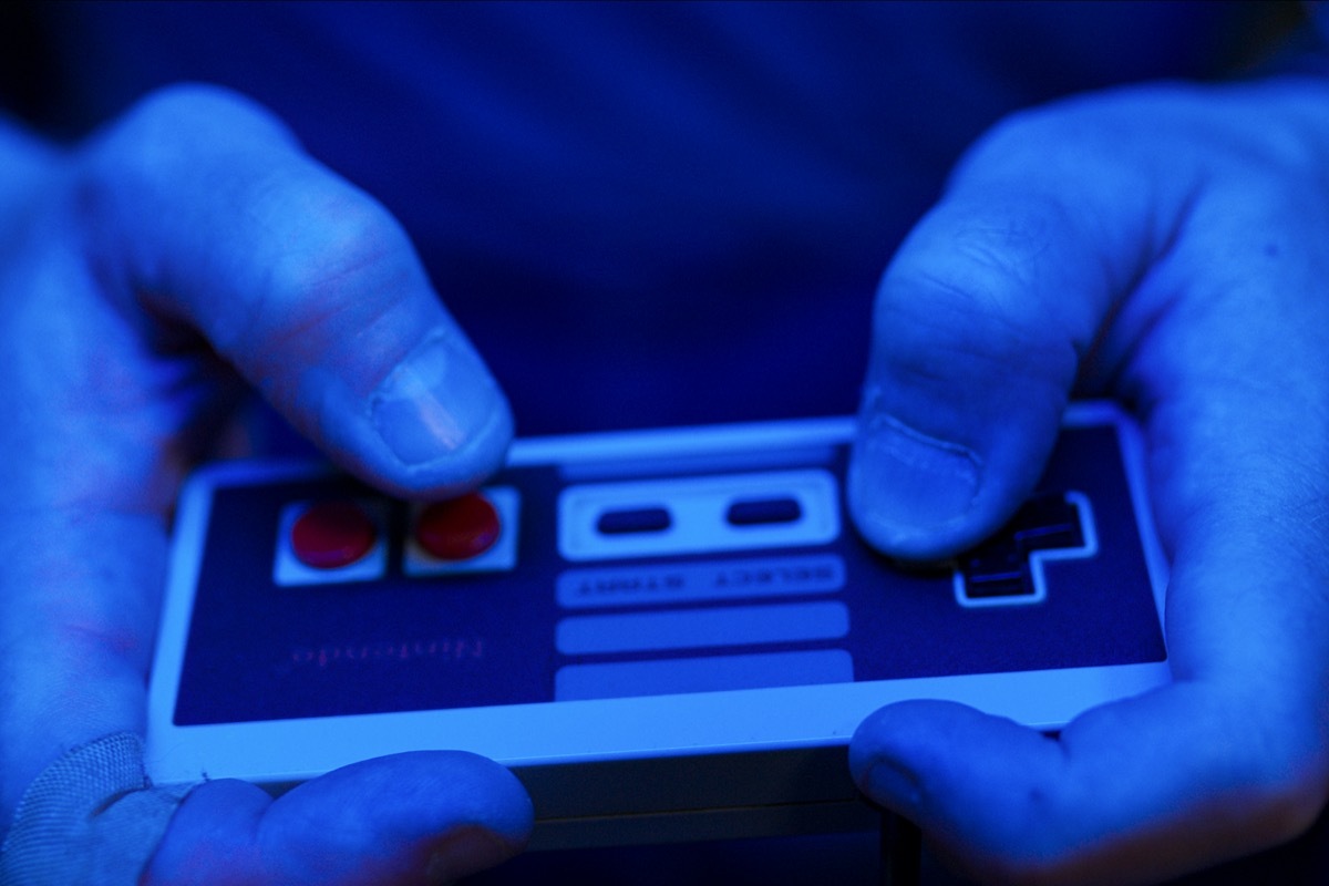 Close up on Nintendo controller from High Score