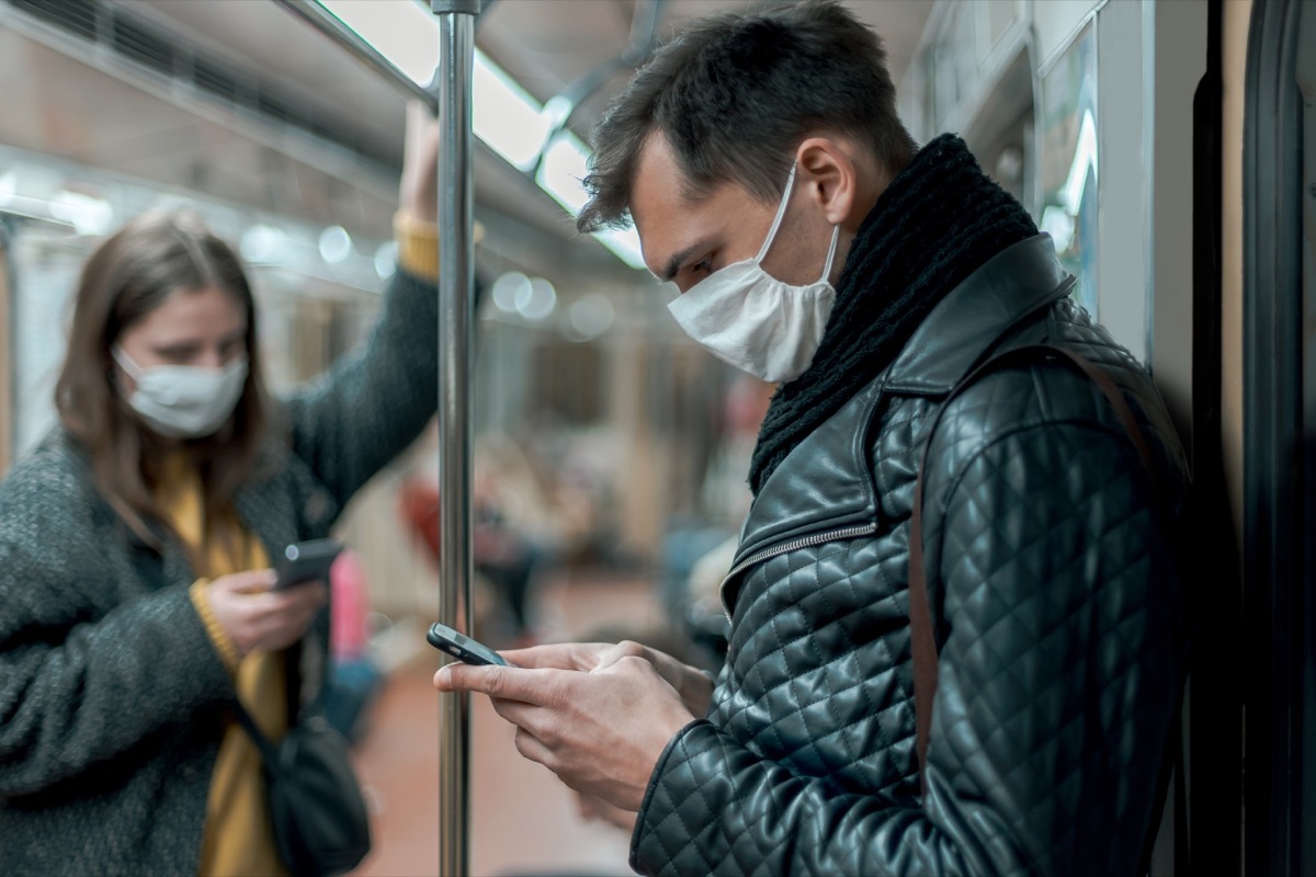 People wearing masks on subway