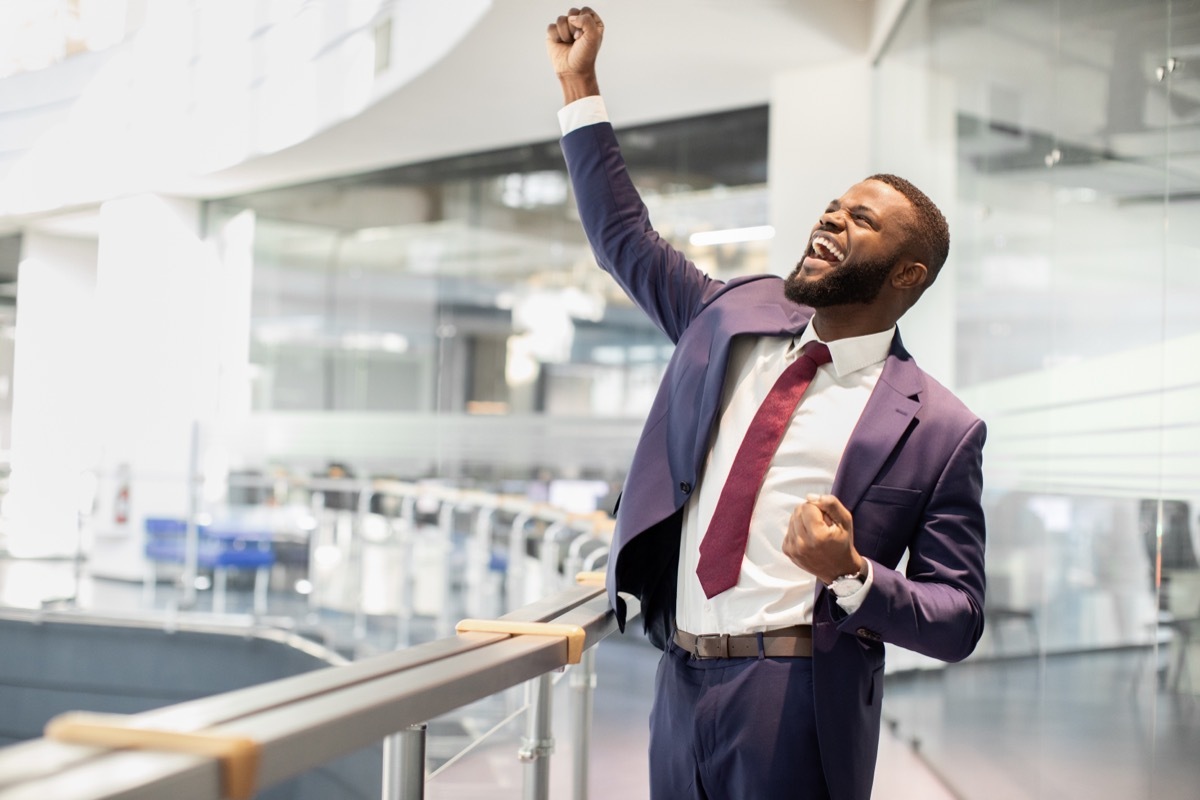 Young Black Man Pumping Fist in the Air