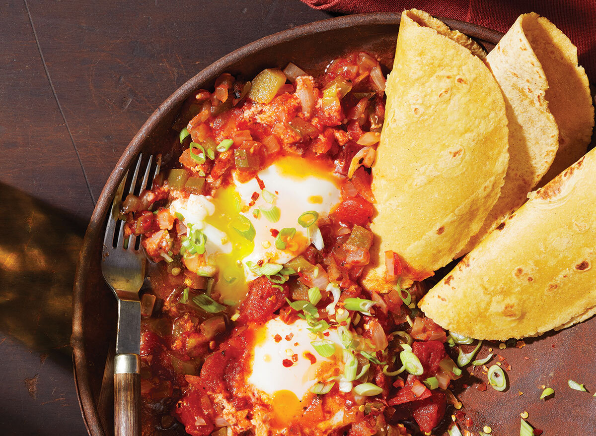 eggs diablo with taco shells in pan