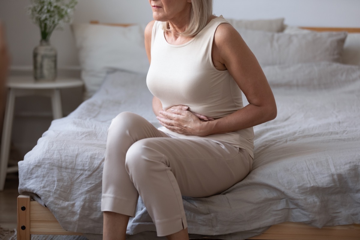 Woman with stomach pain