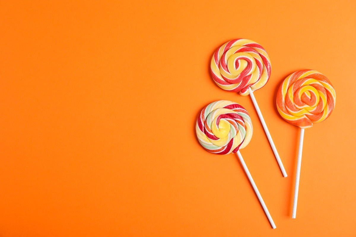 Lollipops on an Orange Background Foods Bad for Dogs