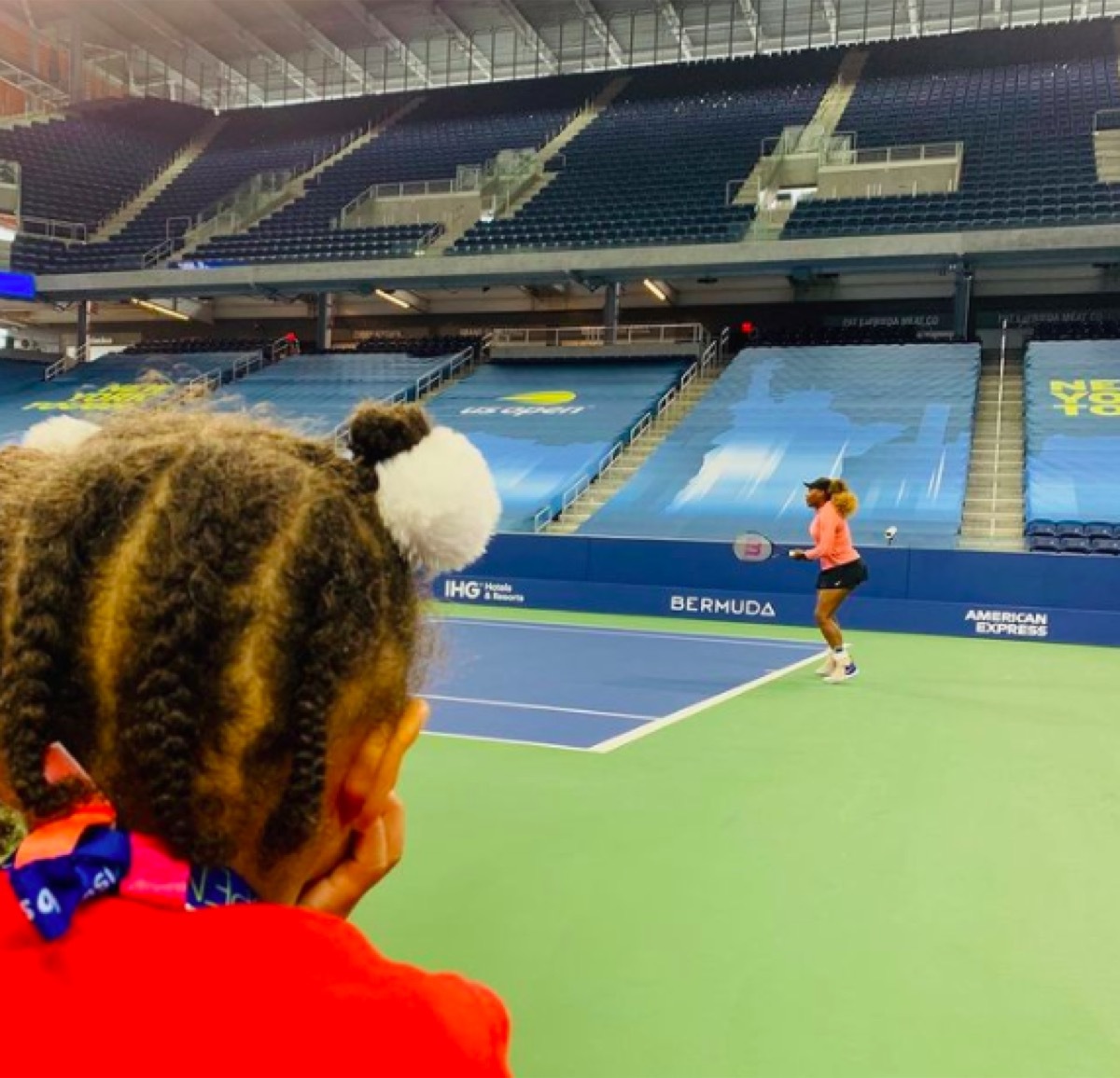 Serena Williams' daughter watching her play tennis