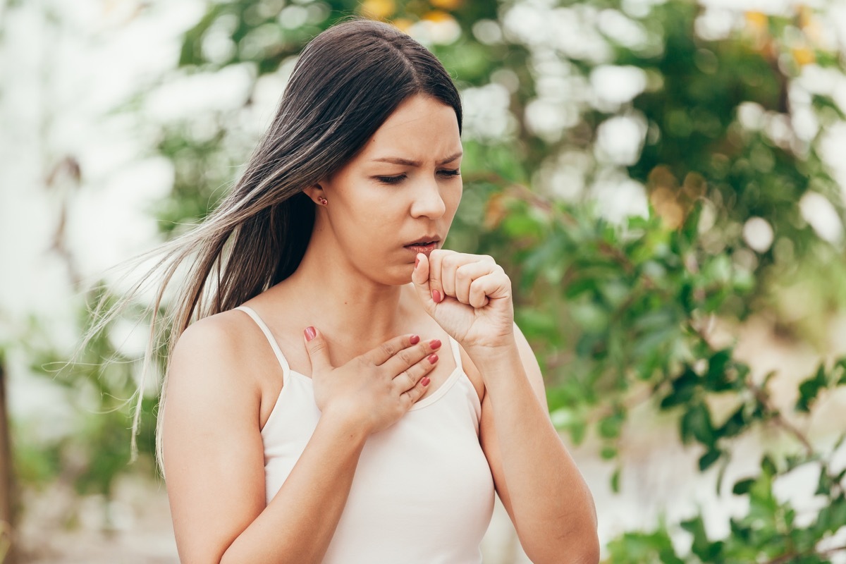 Woman coughing