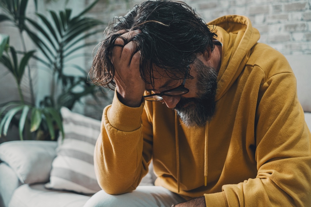 man feeling badly about himself