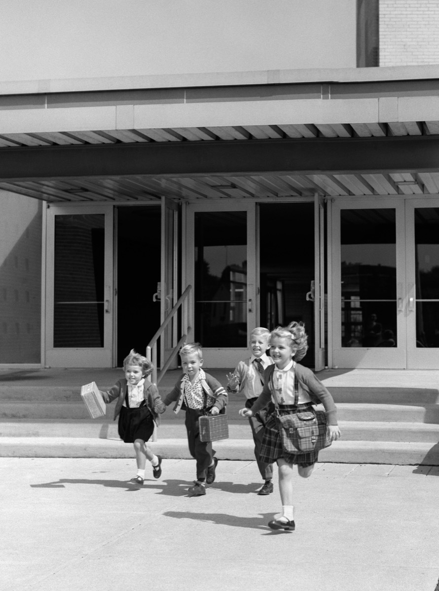 Four young children run free in 1950s from school, shows how different parenting was in the 1950s