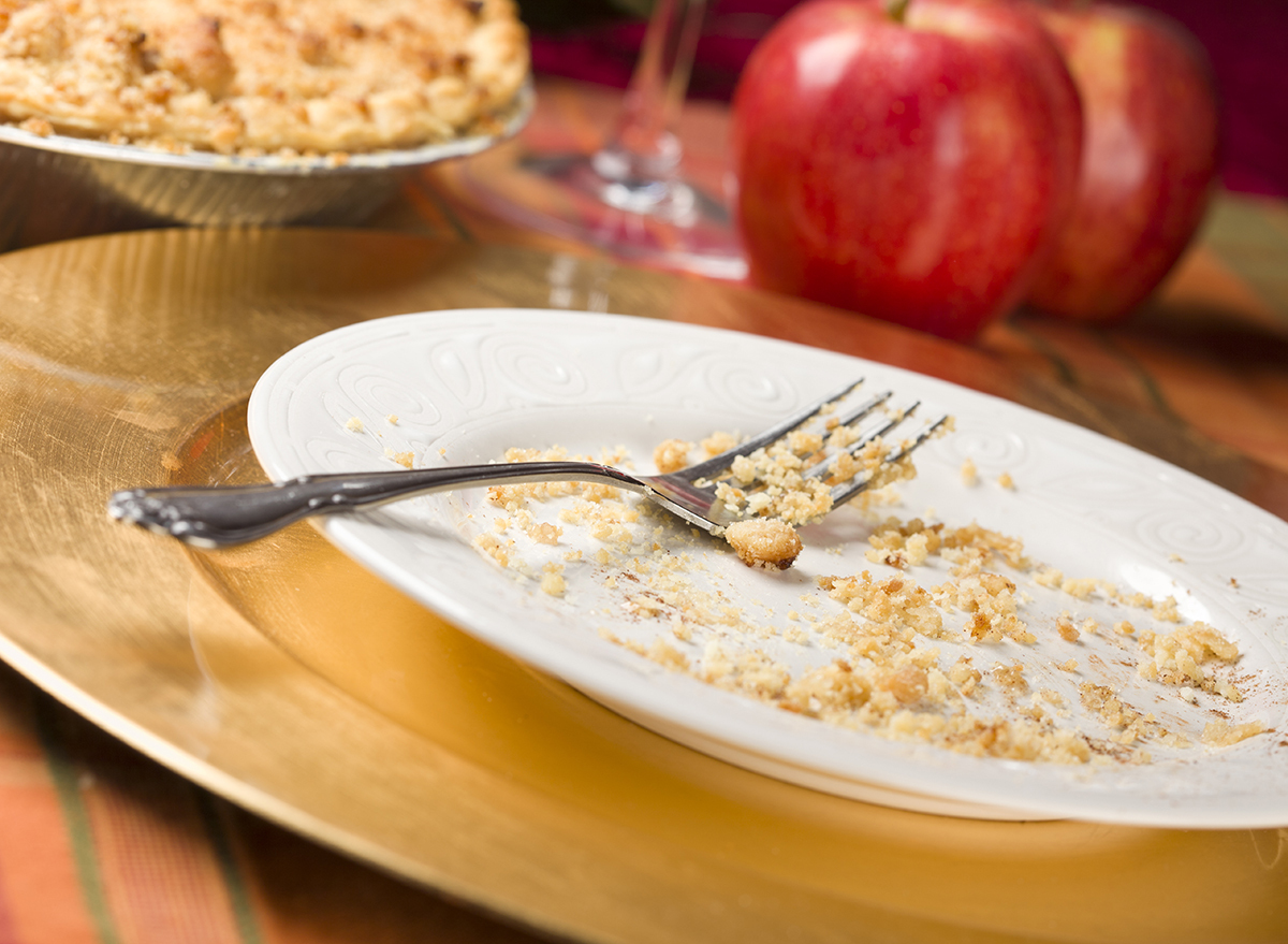 apple pie crumbs on white plate