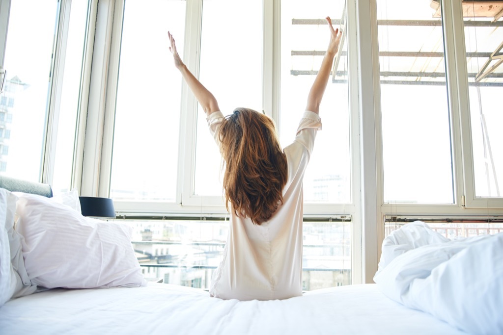 woman waking up punctual stressed out