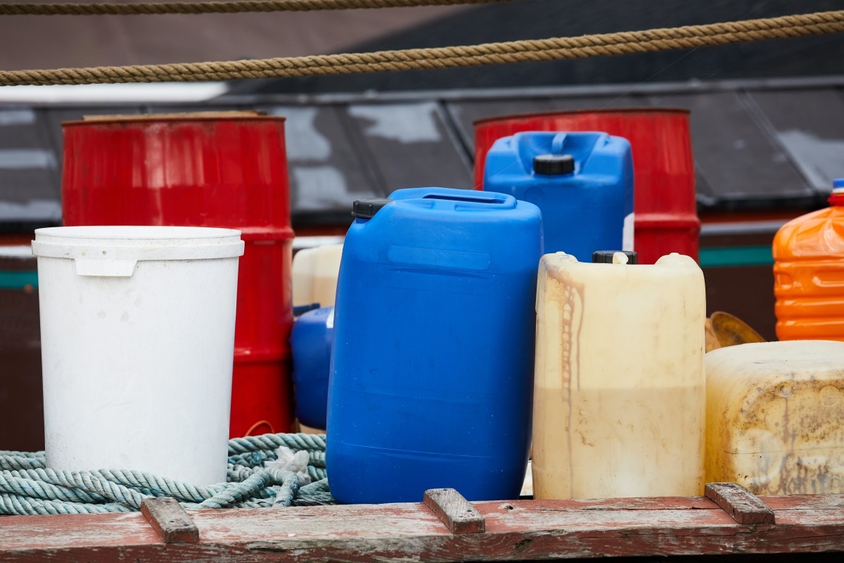 gas cans in a back yard