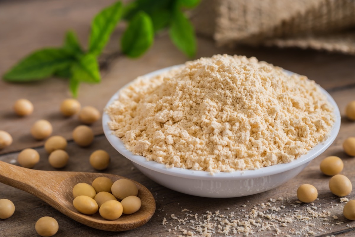 Soy flour in bowl and soybean