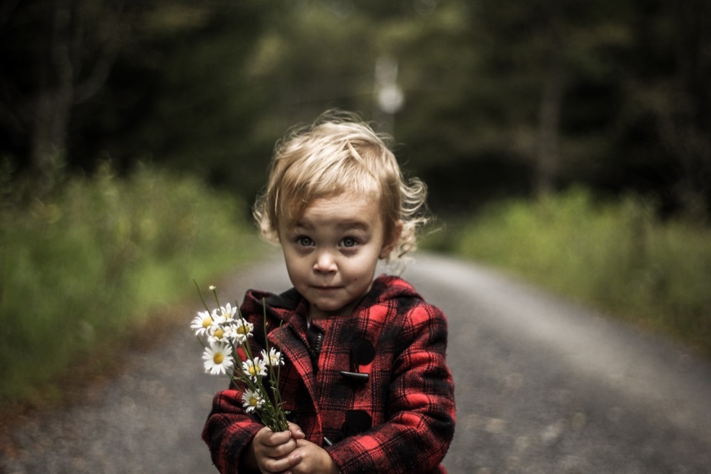 Baby holding flowers - literary baby names 