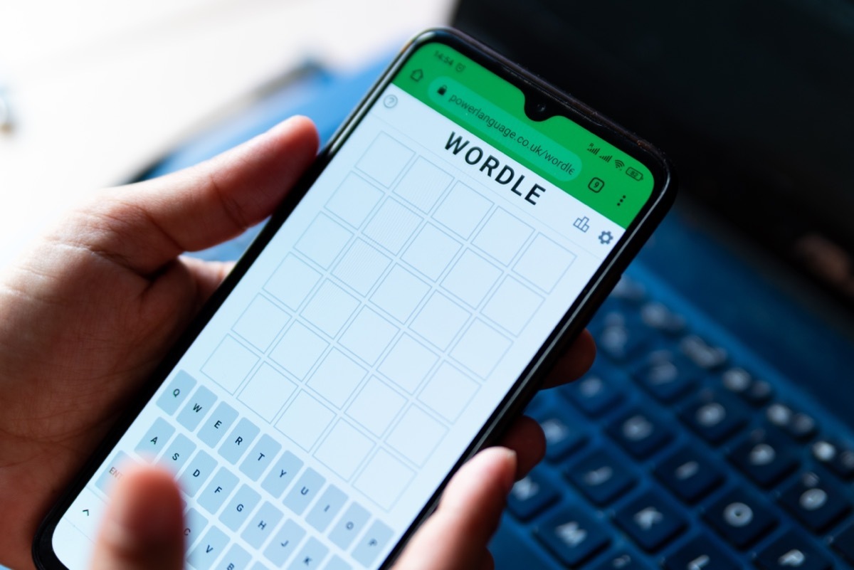 A man plays with the word game Wordle seen in a close up on a mobile phone screen on the official app website in Barcelona, Spain - 9 February 2022.