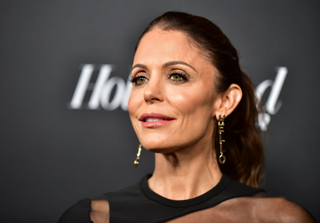 Close up of Bethenny Frankel wearing a black dress with her hair up