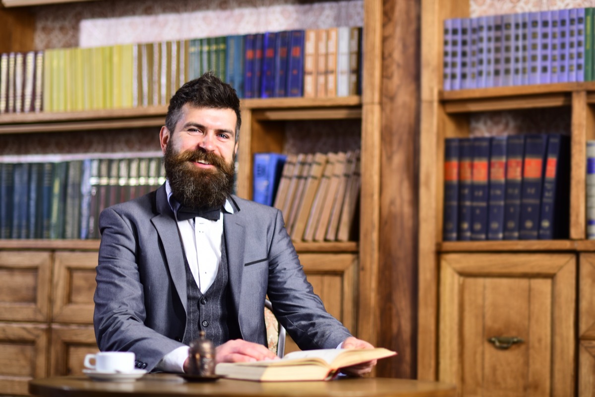 Man Surrounded by Older Books