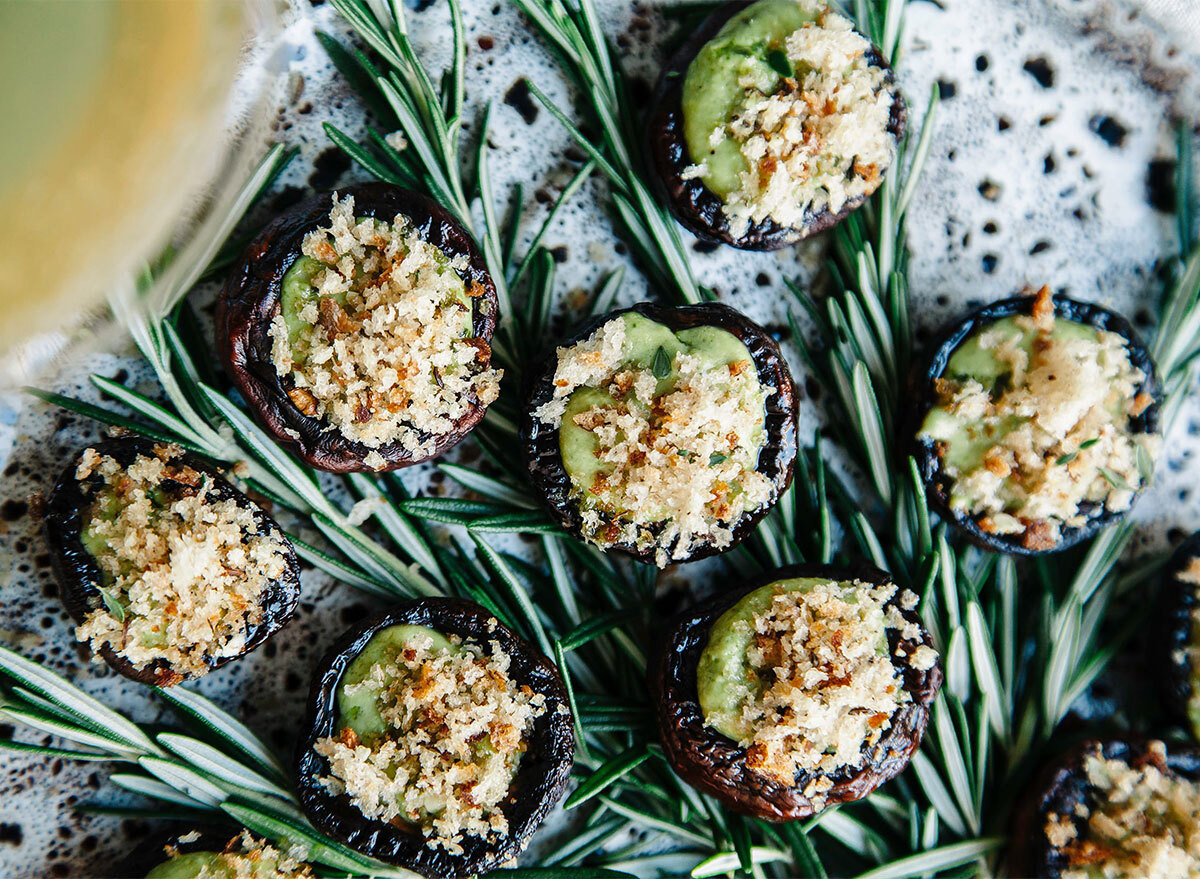 vegan stuffed mushrooms with rosemary sprigs