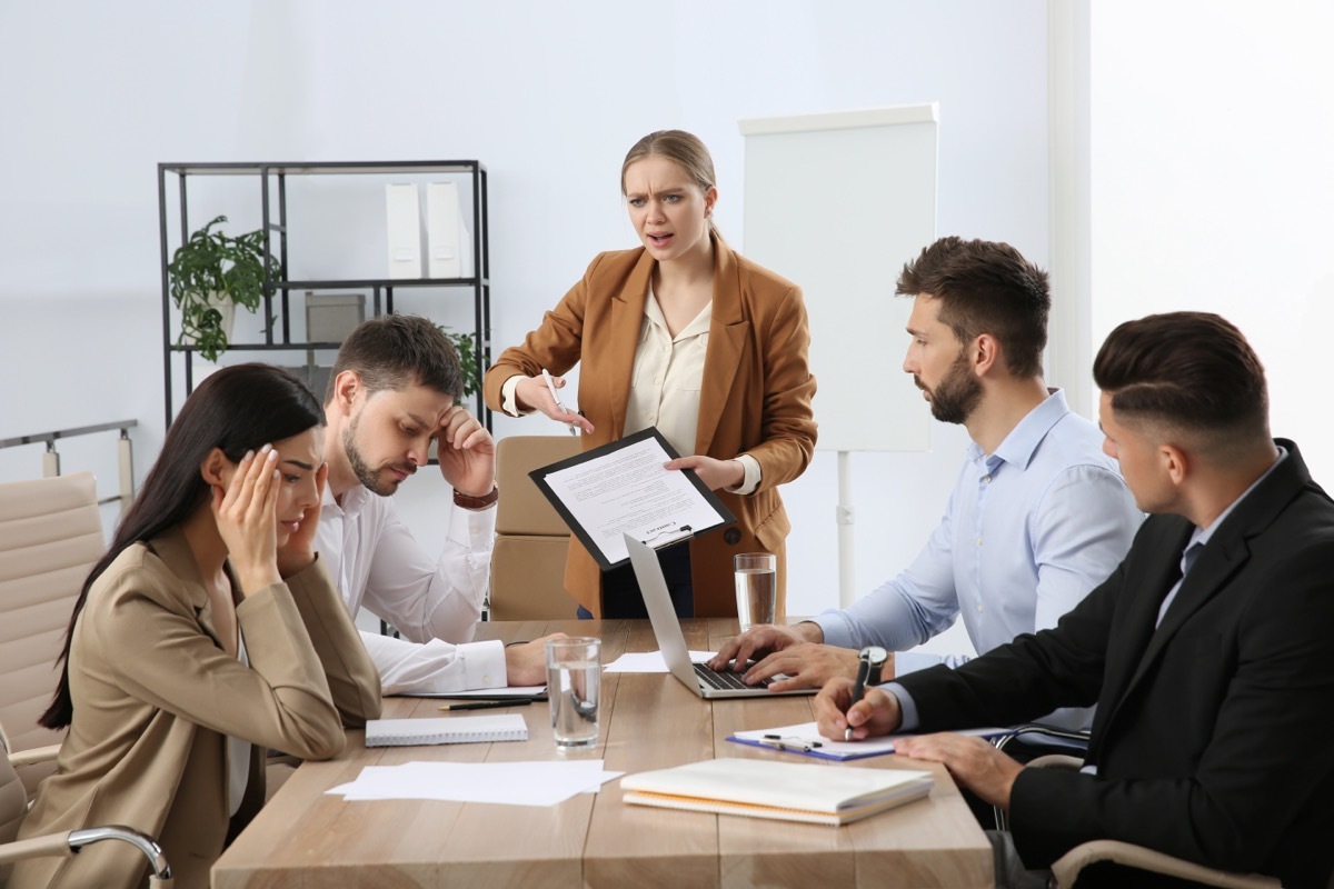 Female Boss Yelling at Employees