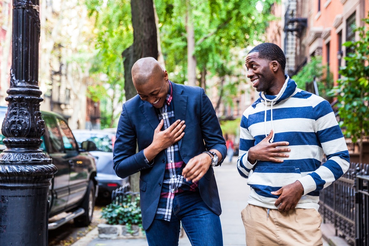 young couple hanging out and walking in Greenwich Village - New York, USA.