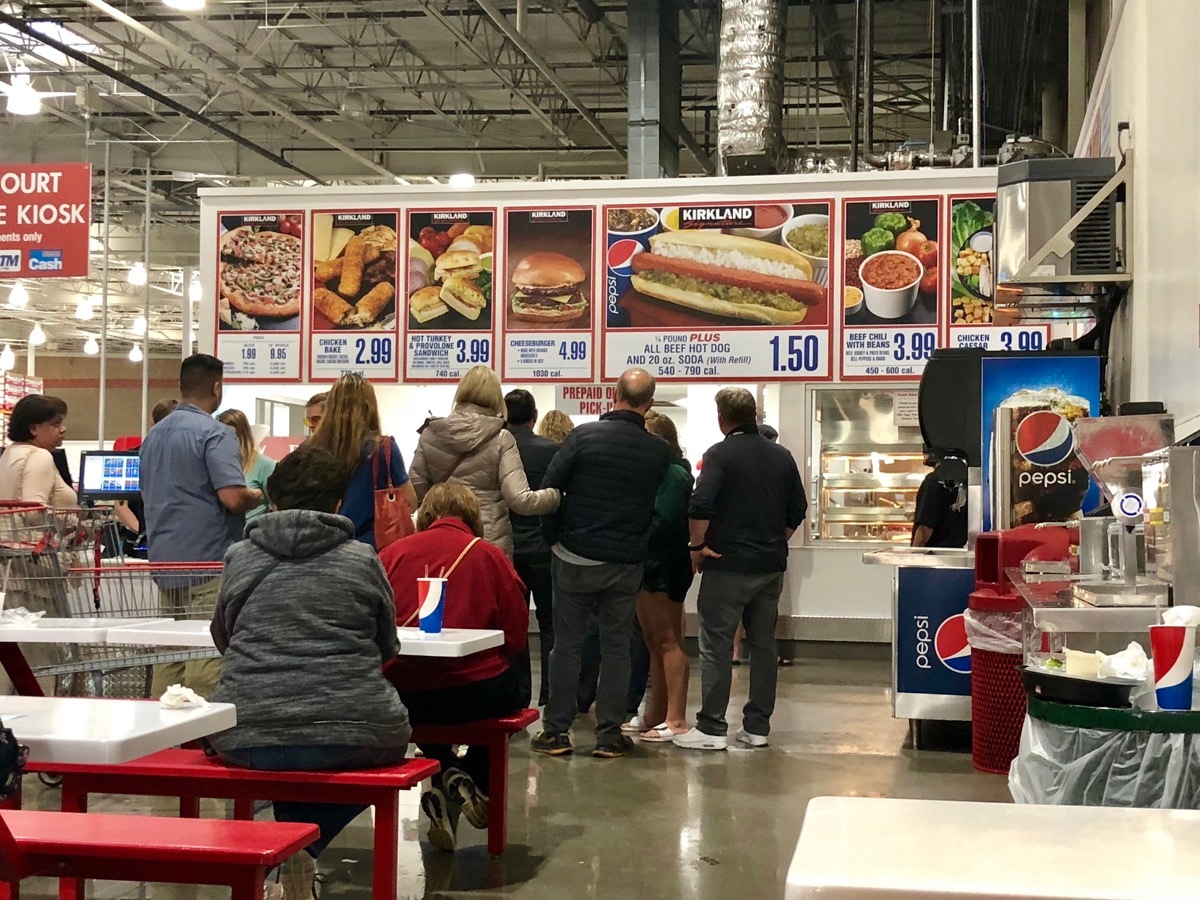 FOLSOM, CA, USA - OCT 8, 2018: Costco food court by the new self serve kiosk full of customers .