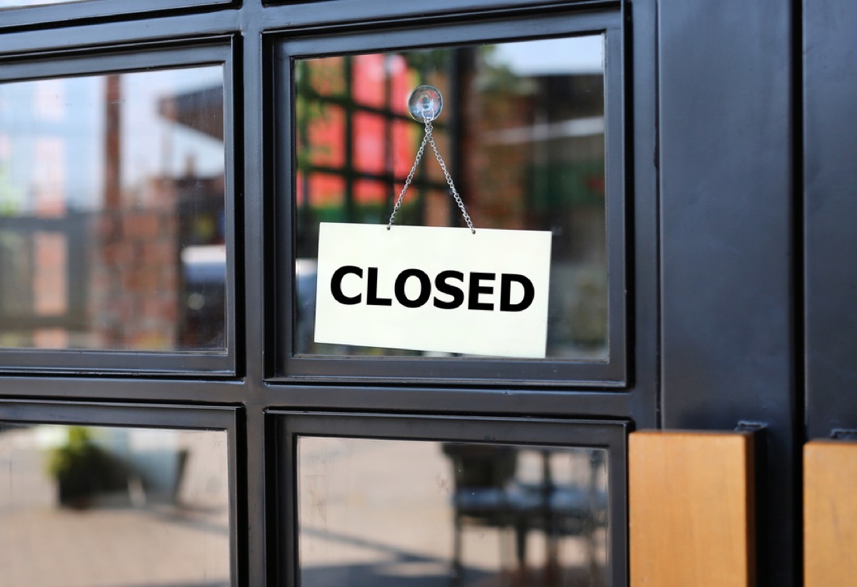 store with closed sign in window, worst things about the suburbs