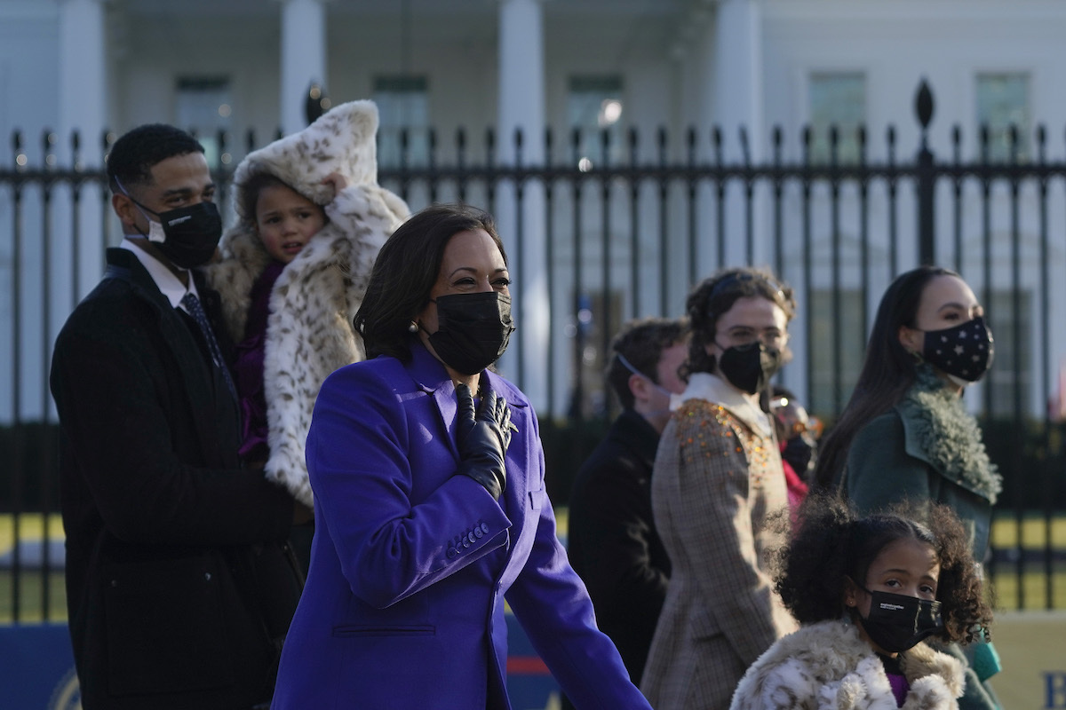 U.S. Vice President Kamala Harris and family members walk the abbreviated parade route after U.S. President Joe Biden's inauguration on January 20, 2021 in Washington, DC. 