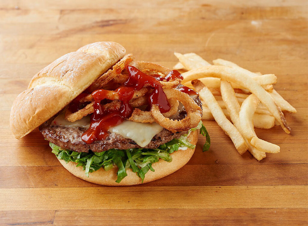 Kidd valley open face burger with onion rings and fries