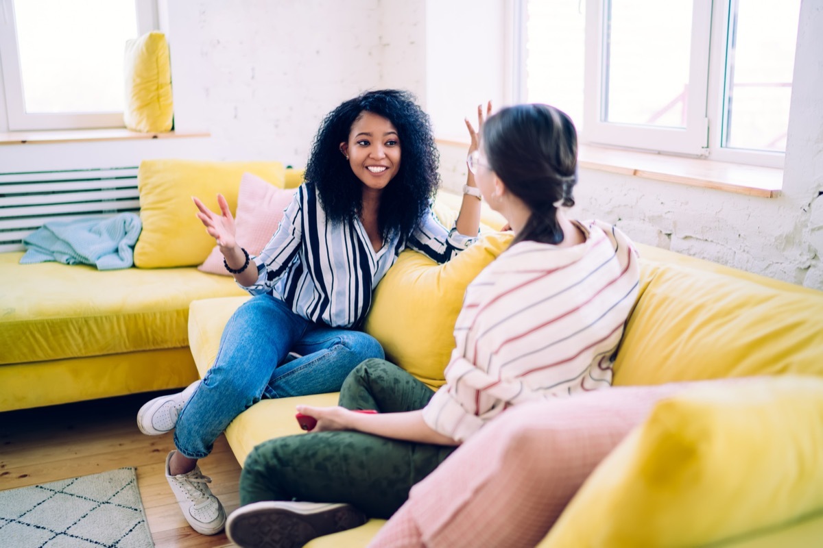 woman telling friend story