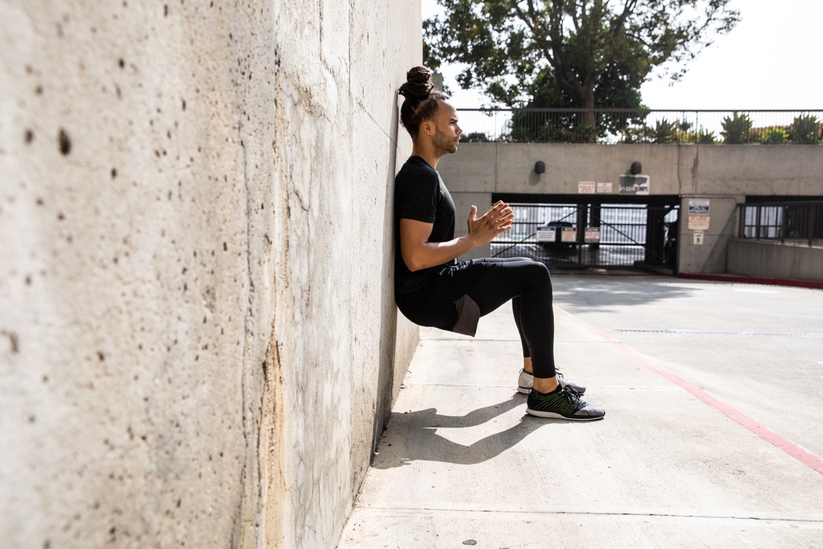 Man doing wall sits