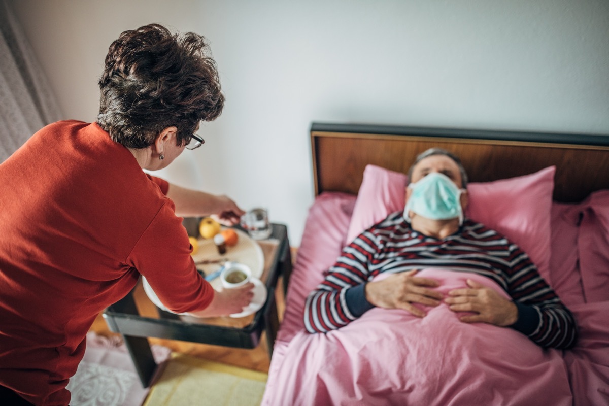 taking care of a sick coronavirus patient woman providing food